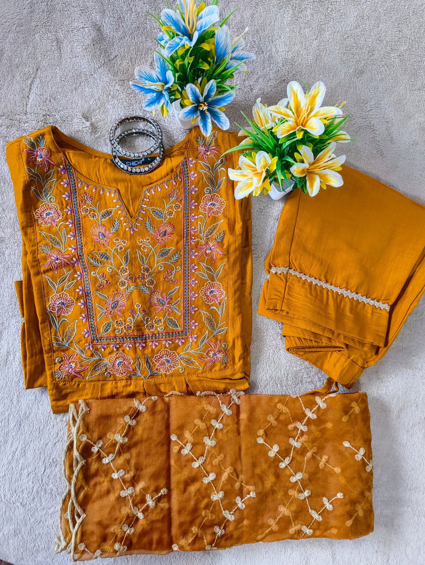 Beautiful Embroidered 3piece trousers suit with Heavy Embroidery dupatta.