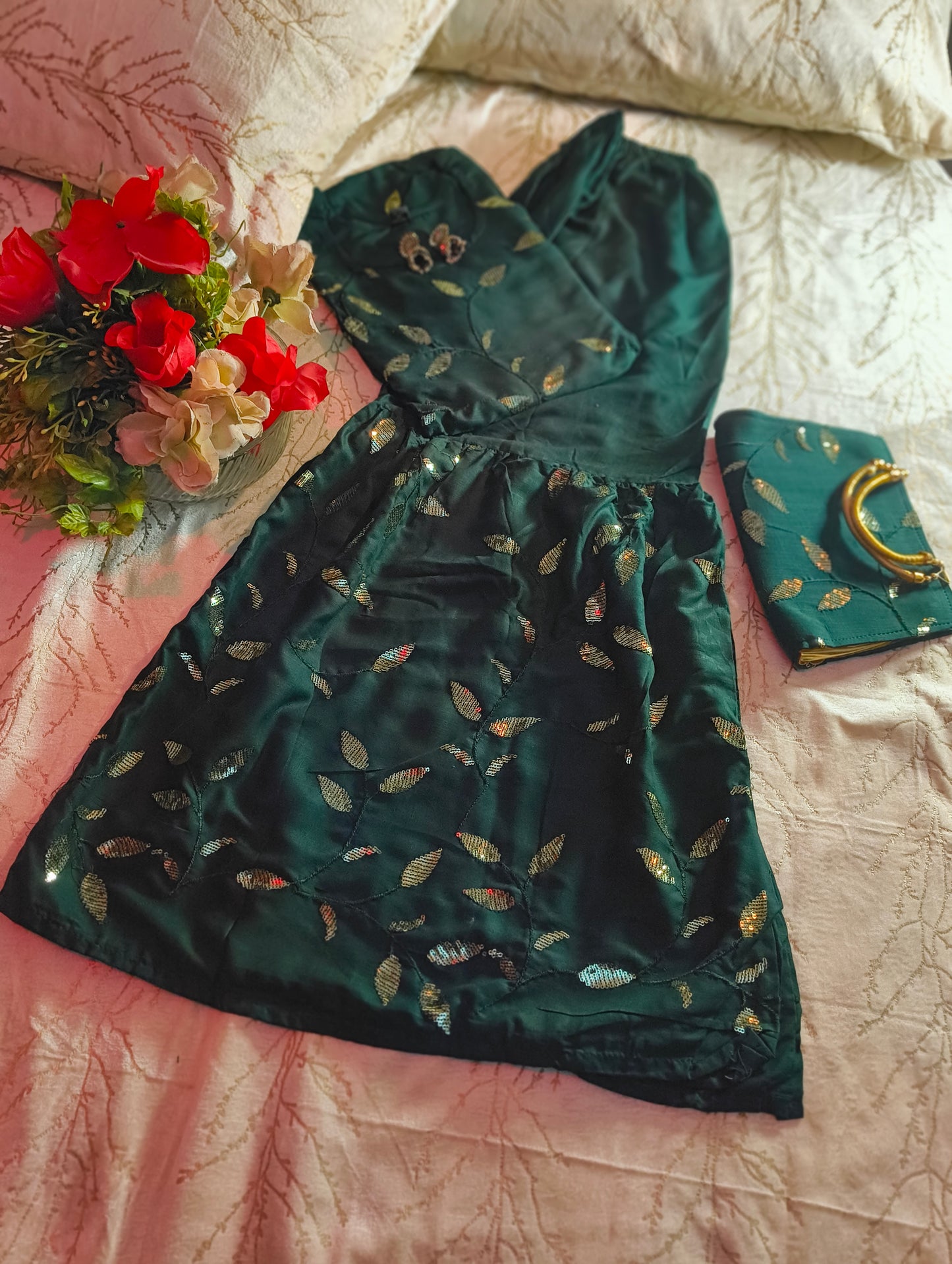 Beautiful Bottle green Heavy sequence work party wear sharara suit with matching purse.