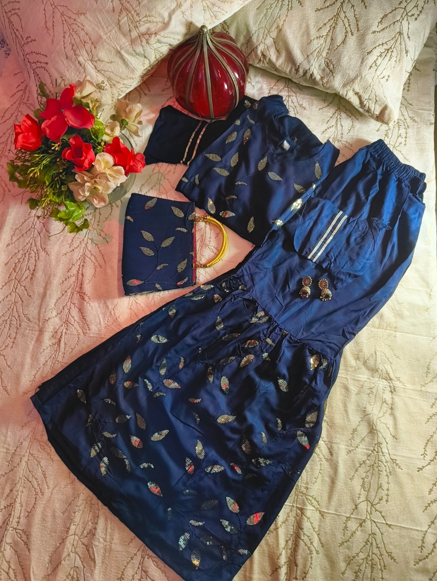 Beautiful Heavy sequence work party wear sharara suit with matching purse.